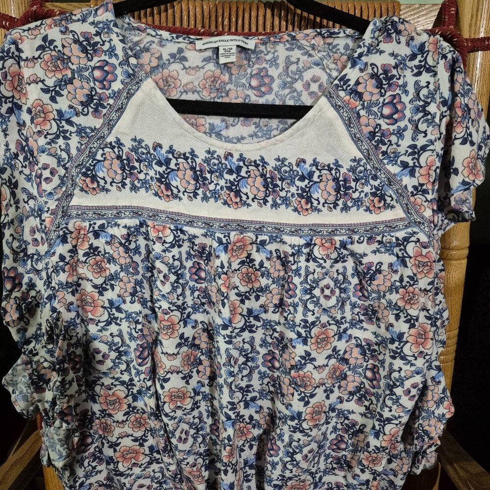 Blouse flutter sleeve top.